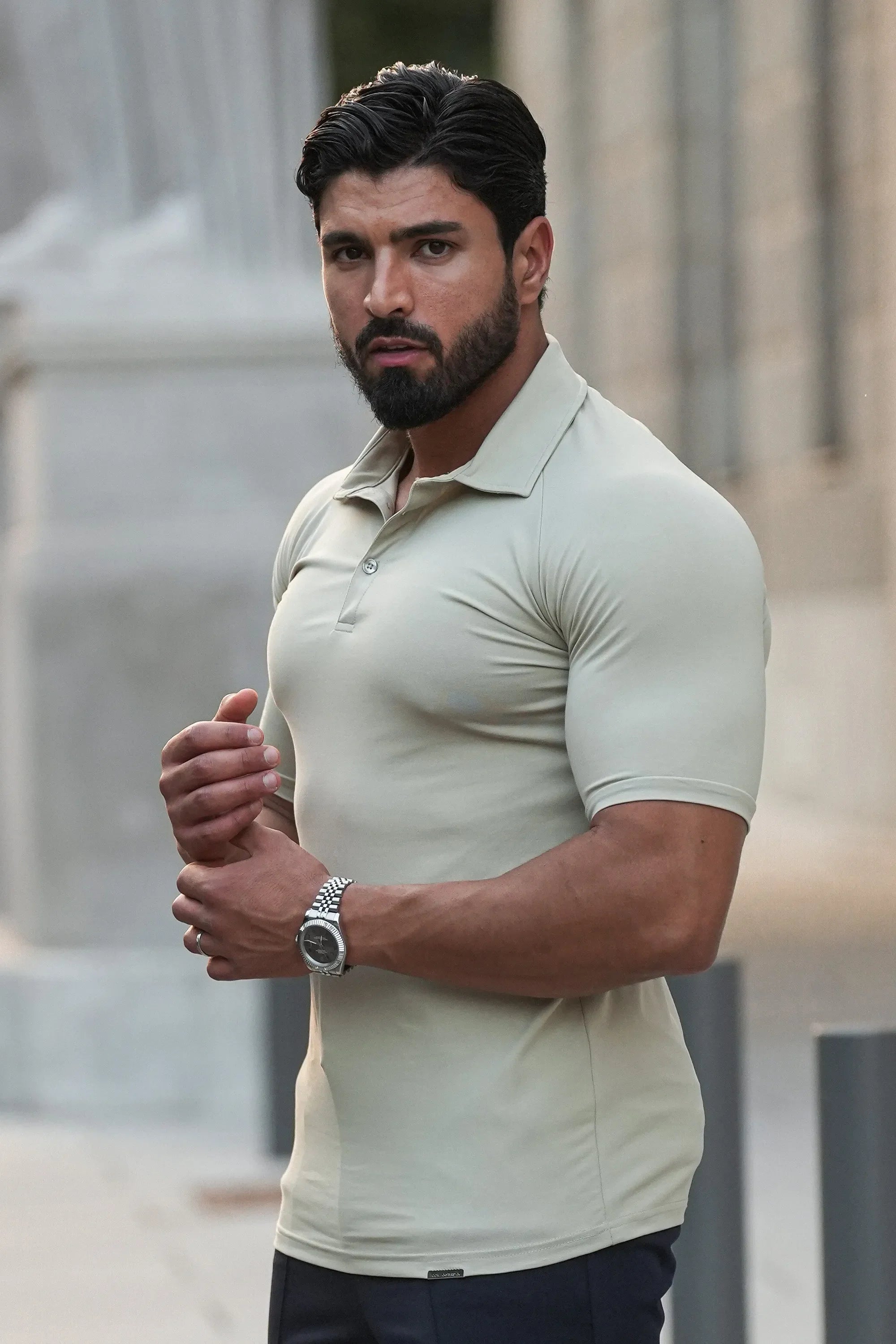 THE MUSCLE BUTTON POLO