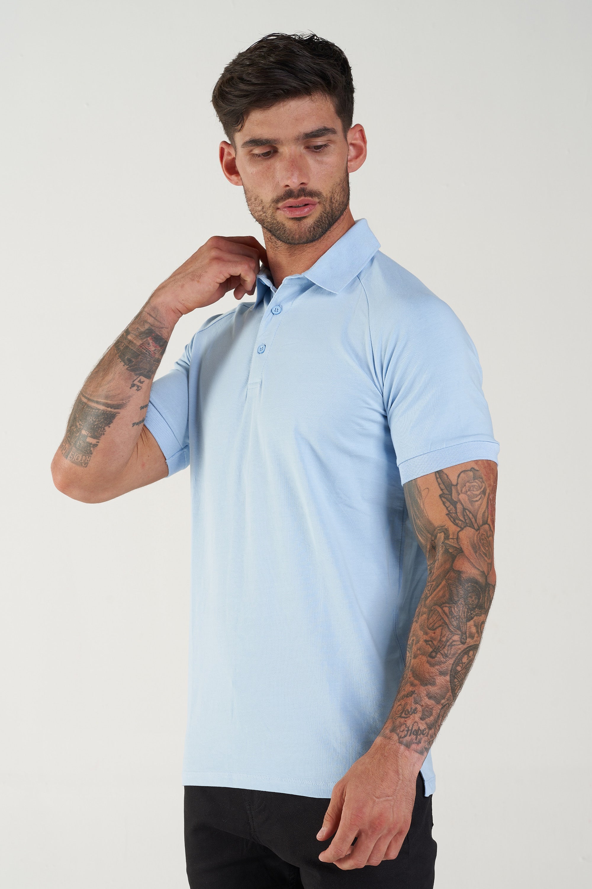 THE MUSCLE BUTTON POLO