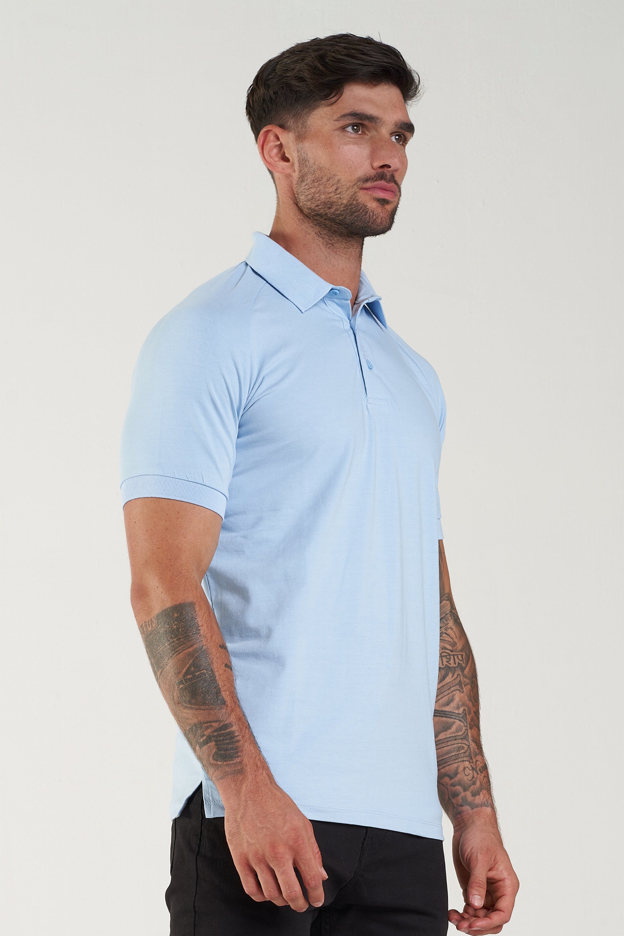 THE MUSCLE BUTTON POLO