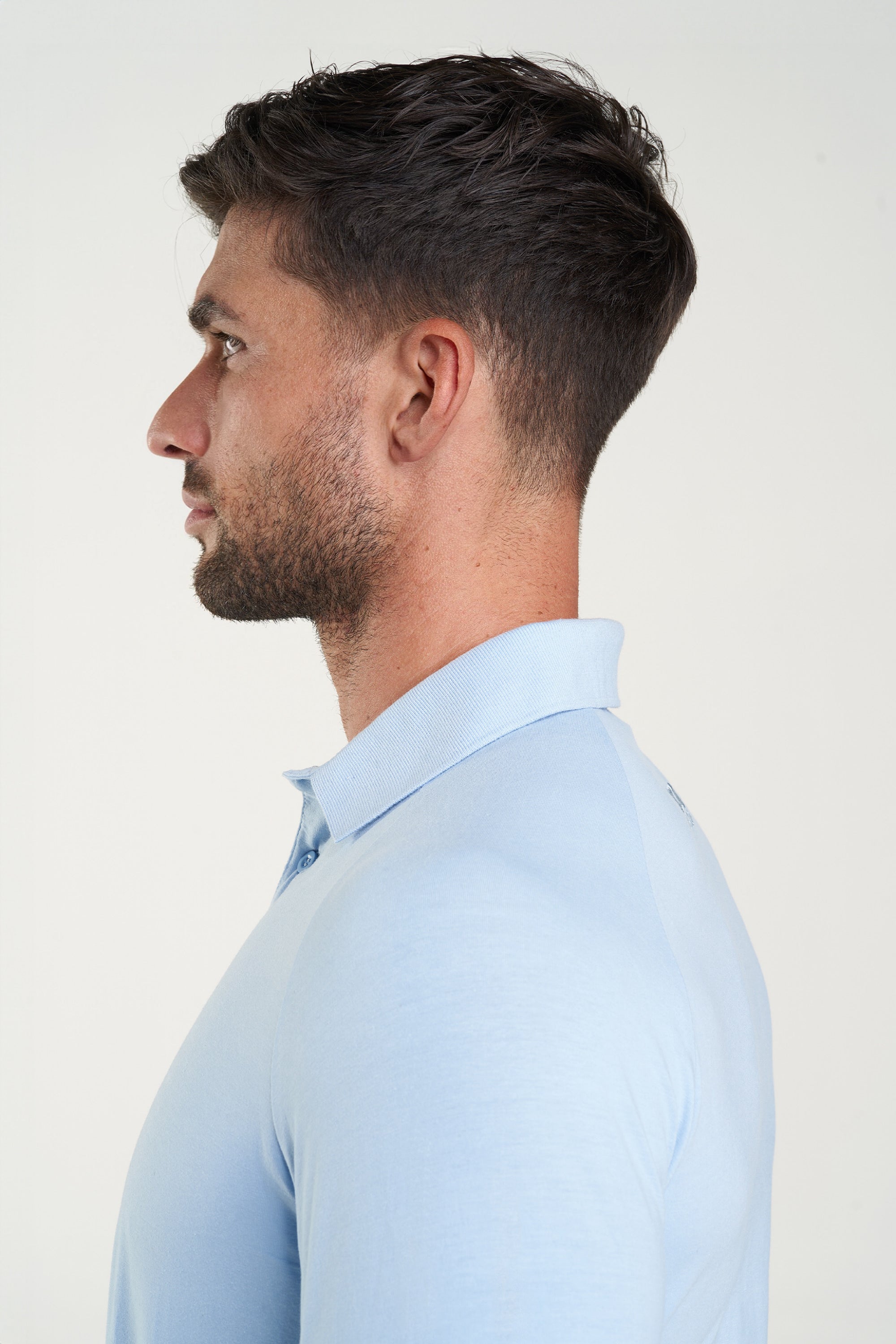 THE MUSCLE BUTTON POLO