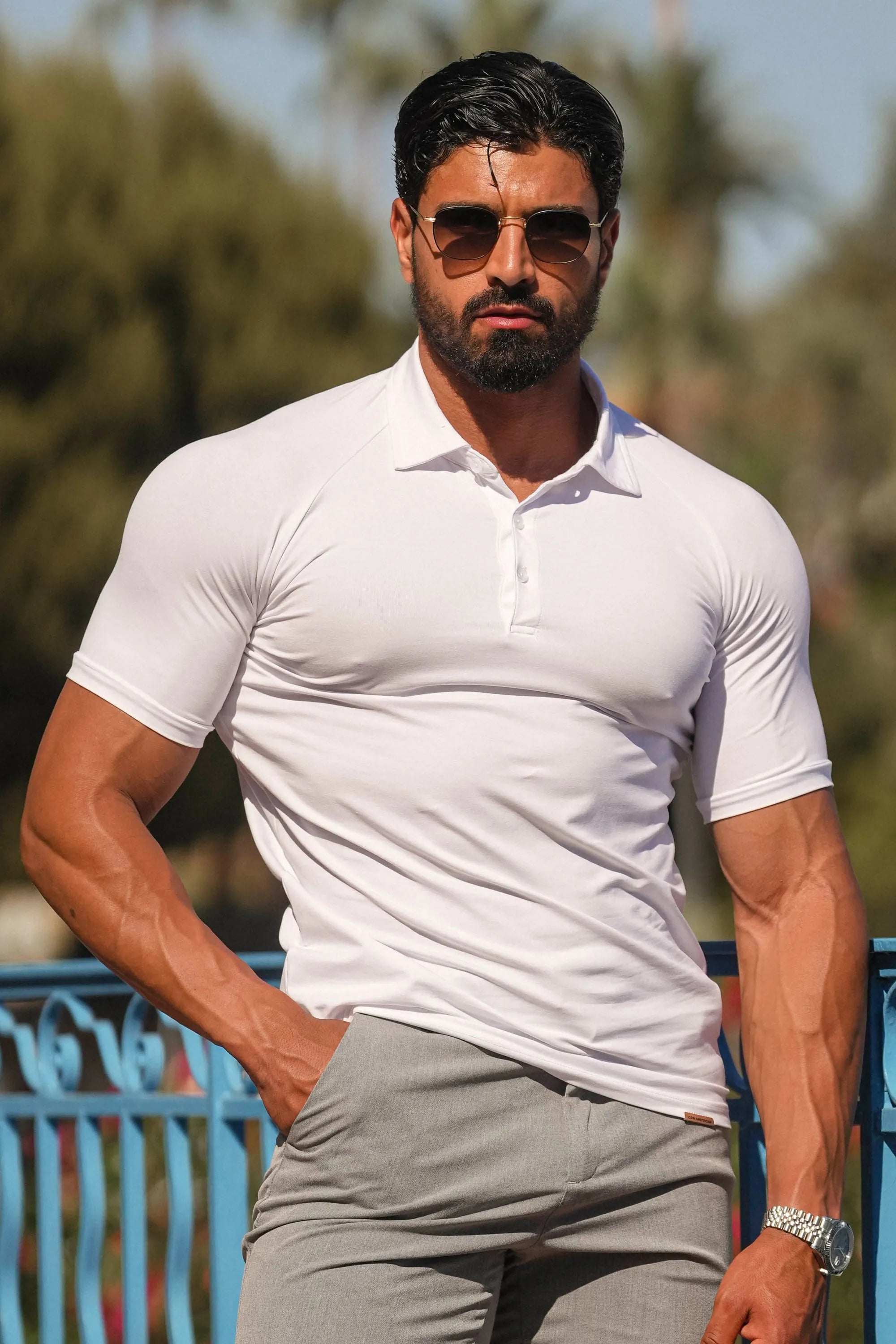 THE MUSCLE BUTTON POLO