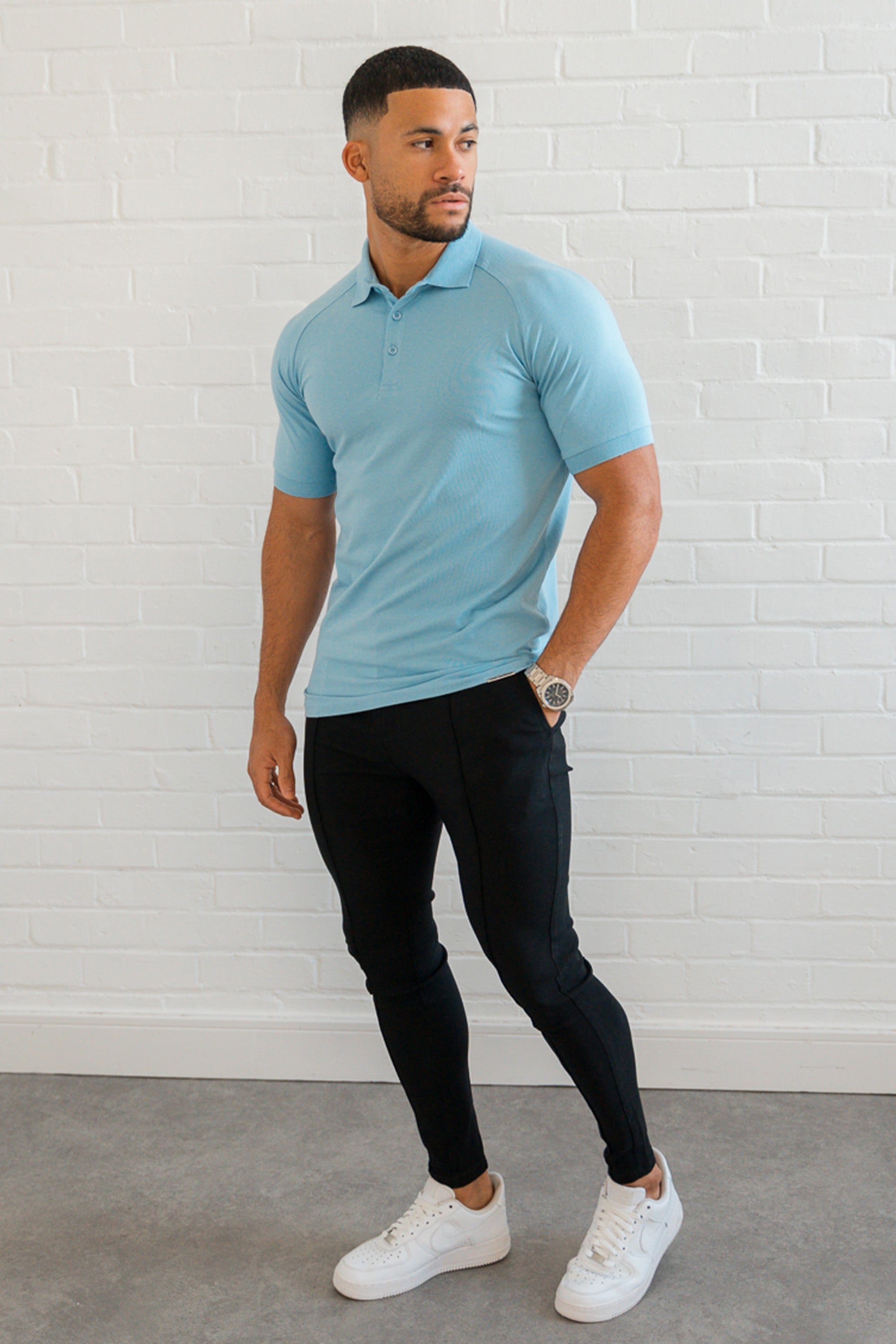 THE MUSCLE BUTTON POLO