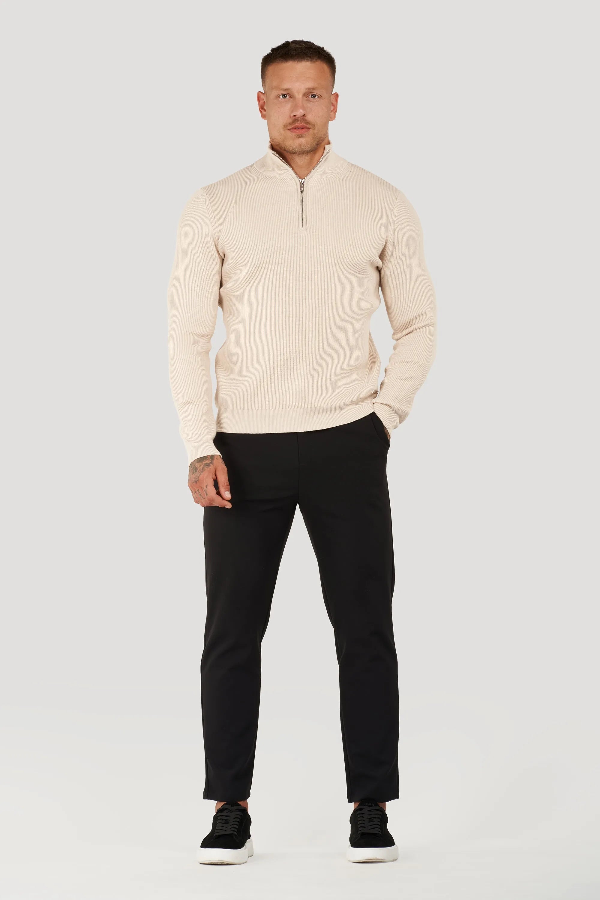 THE RENZO HALF ZIP SWEATER