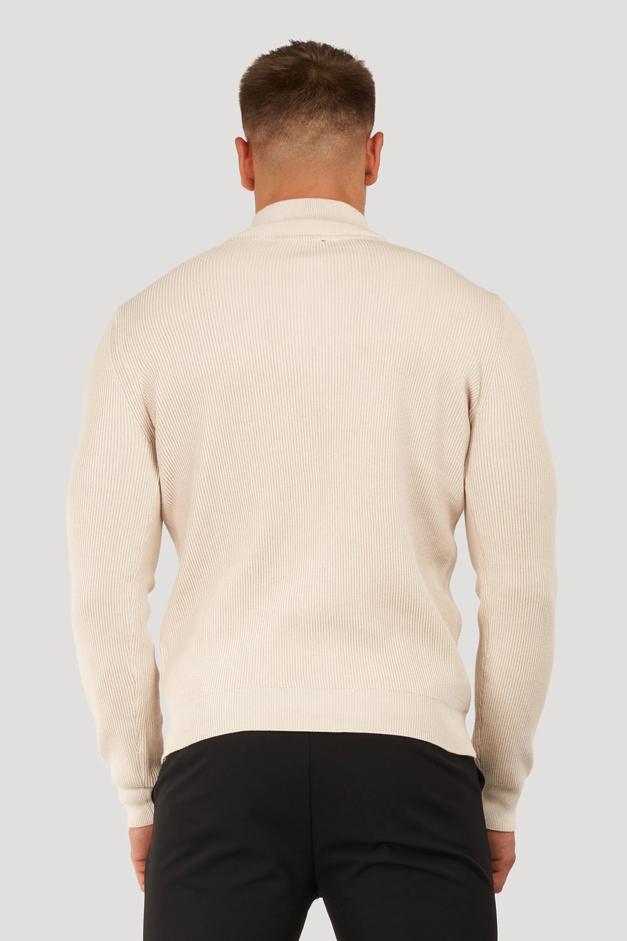 THE RENZO HALF ZIP SWEATER