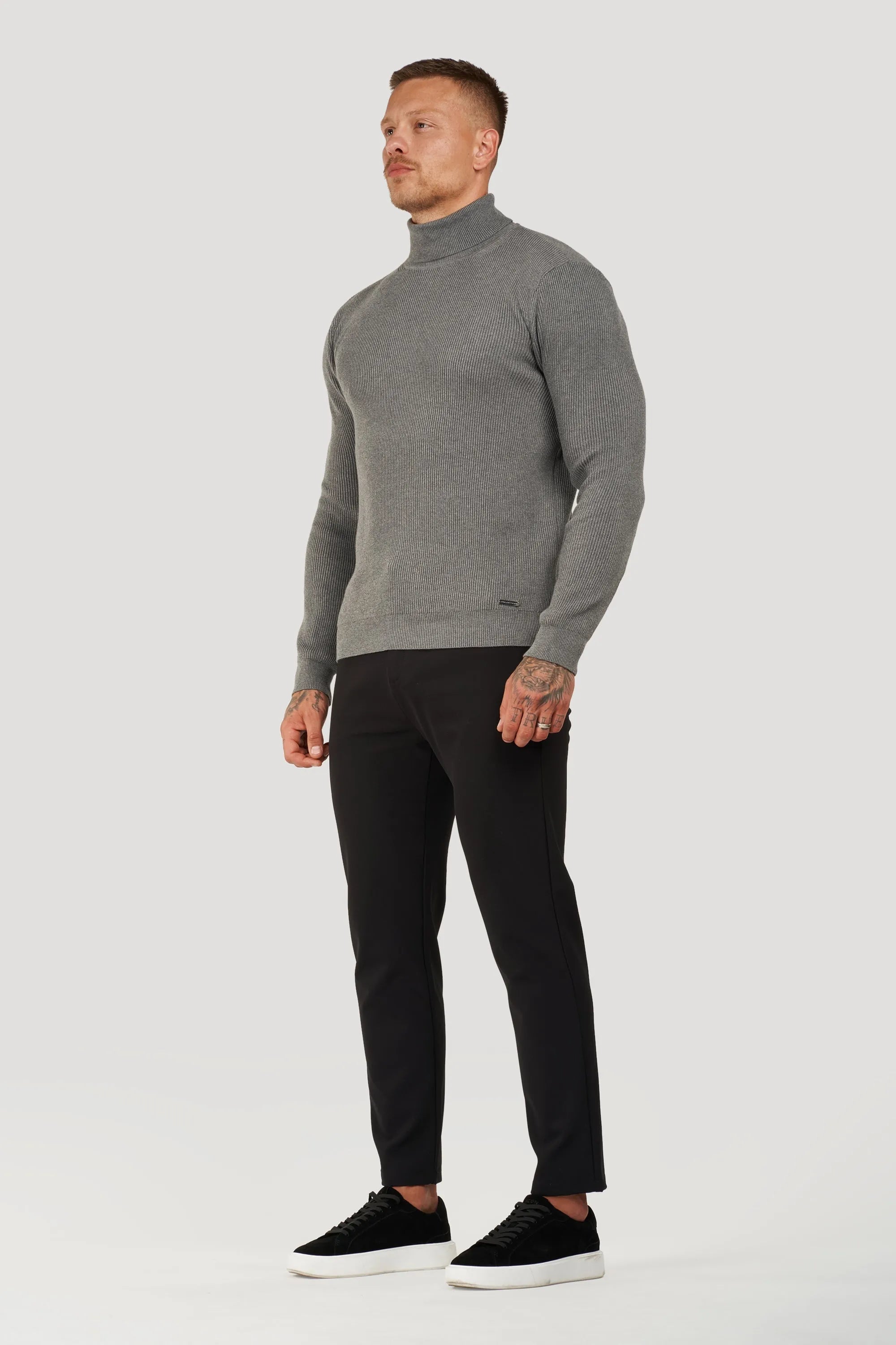 THE RENZO TURTLE NECK SWEATER