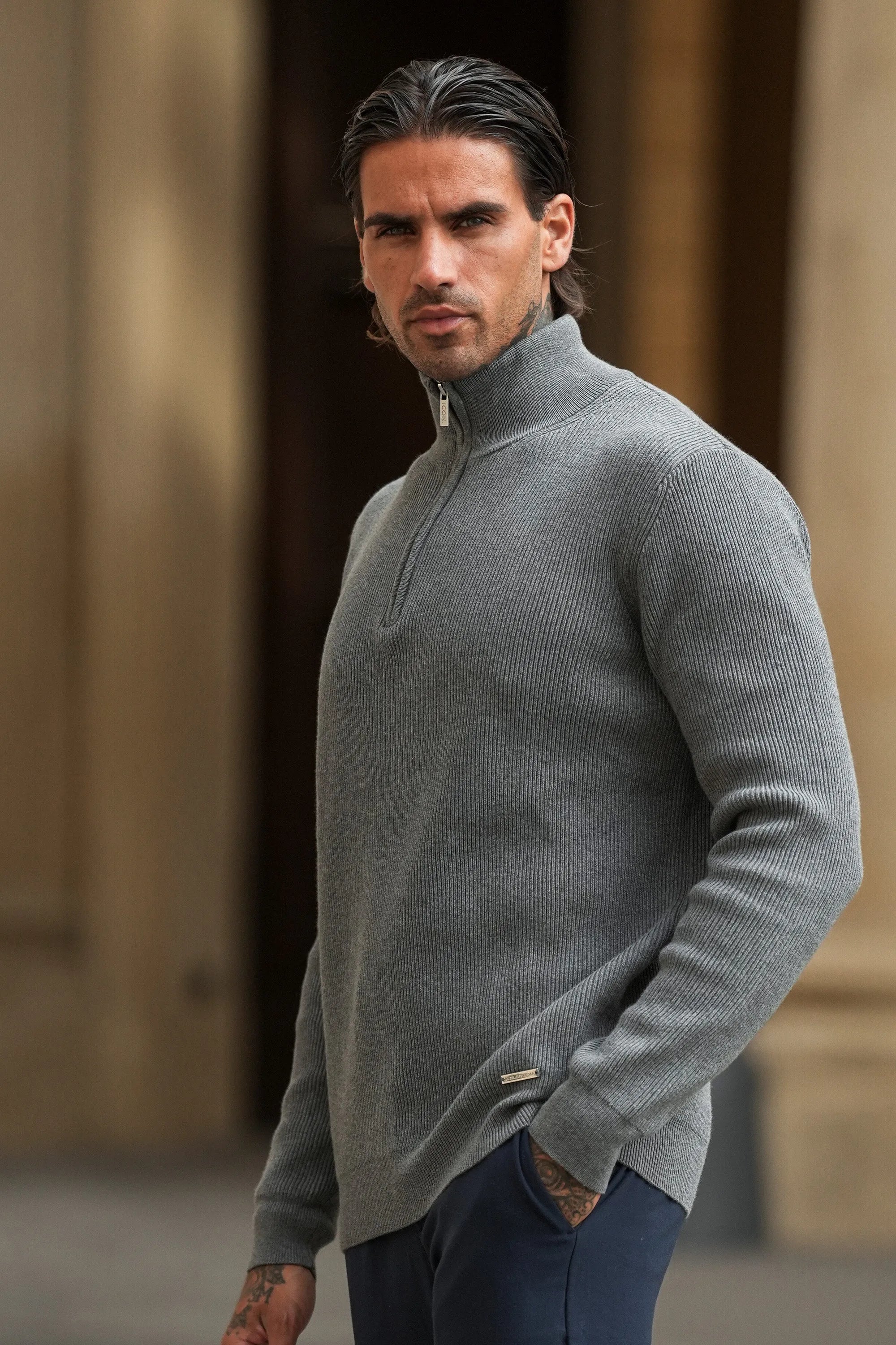 THE RENZO HALF ZIP SWEATER