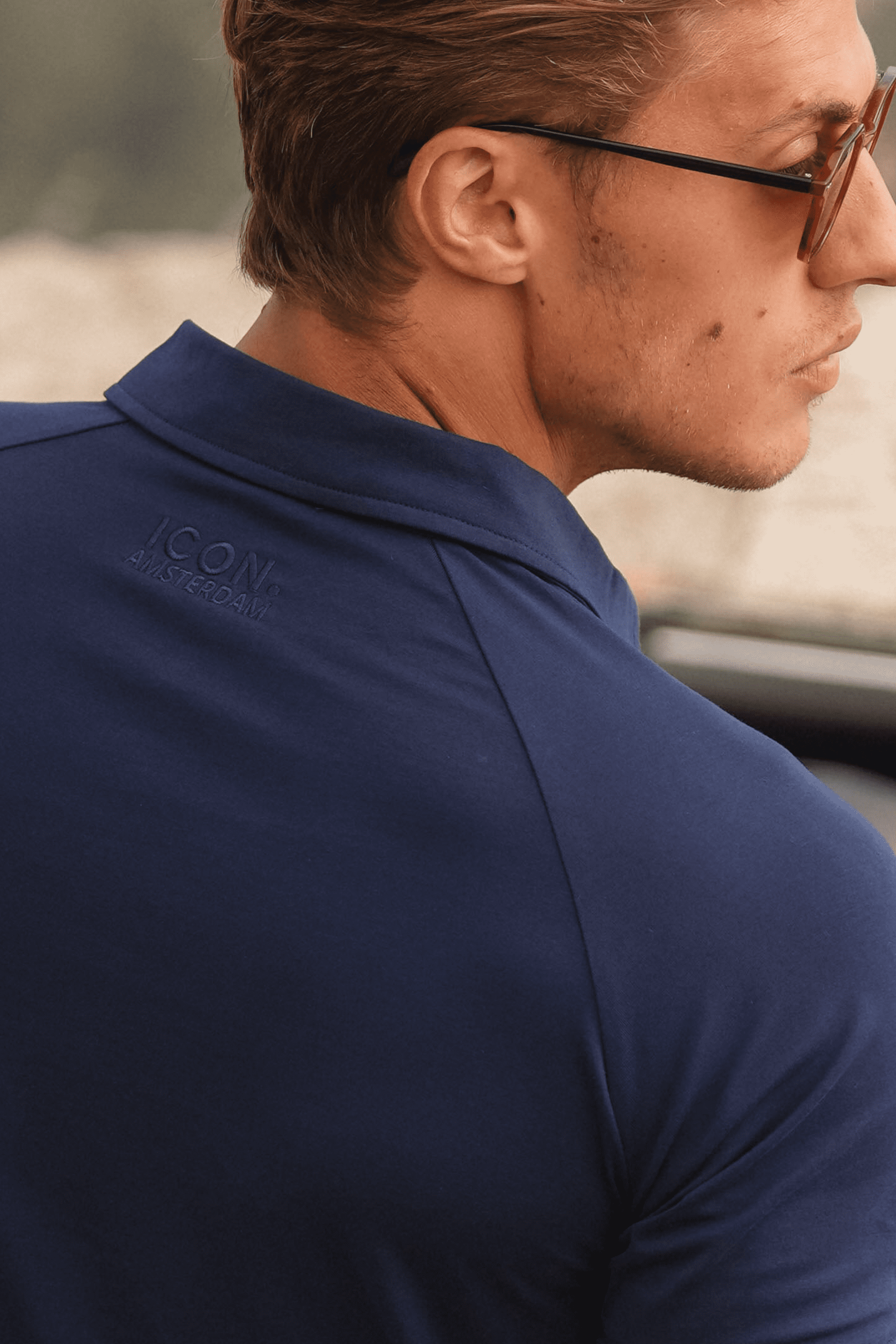 THE MUSCLE BUTTON POLO