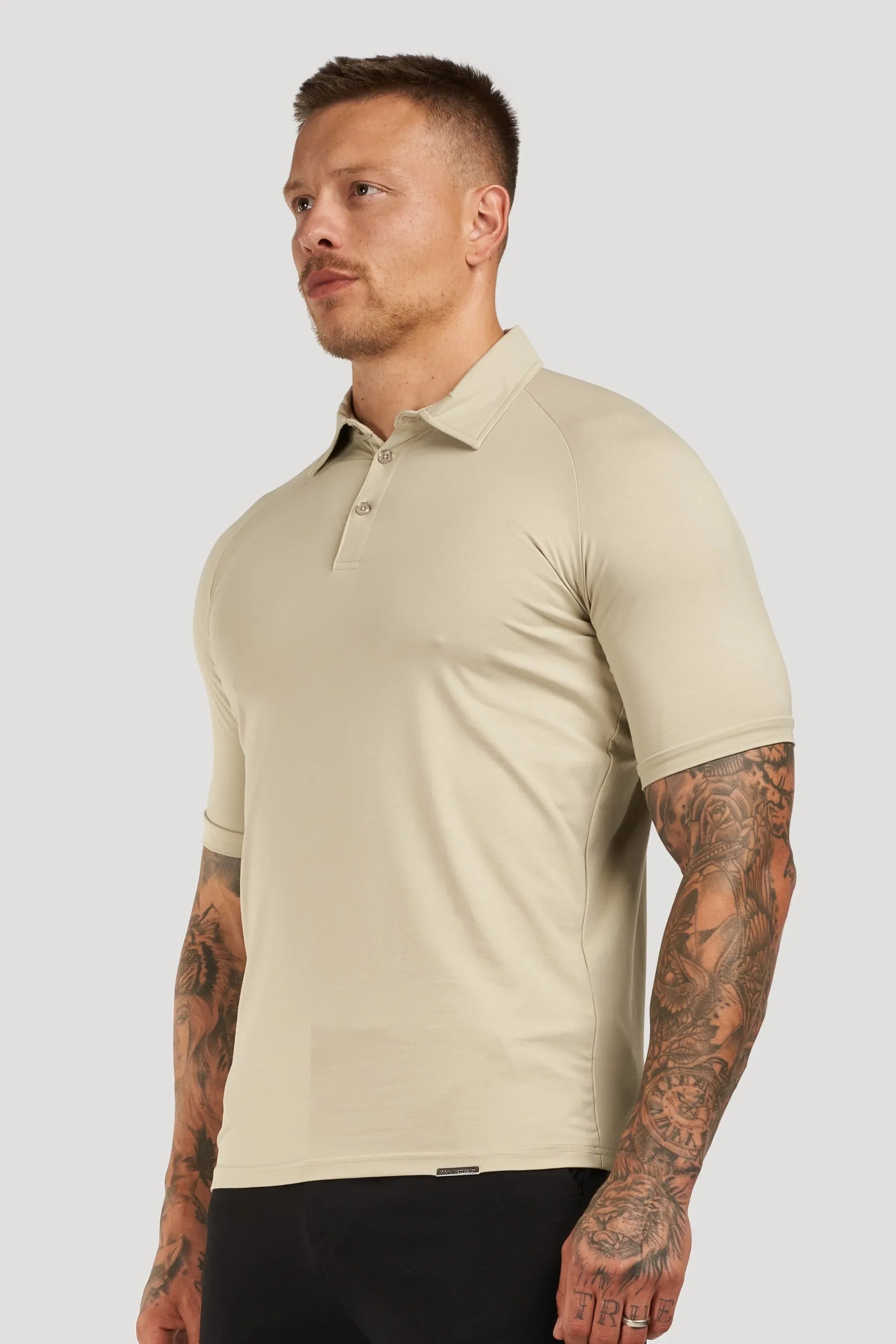 THE MUSCLE BUTTON POLO