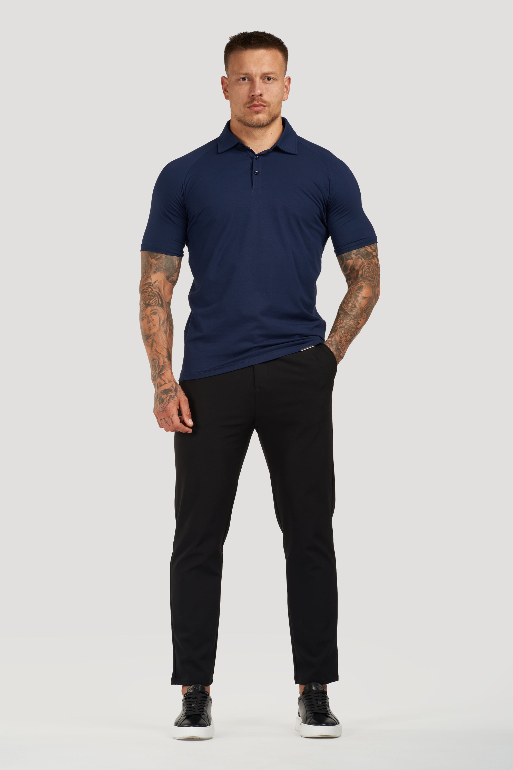 THE MUSCLE BUTTON POLO