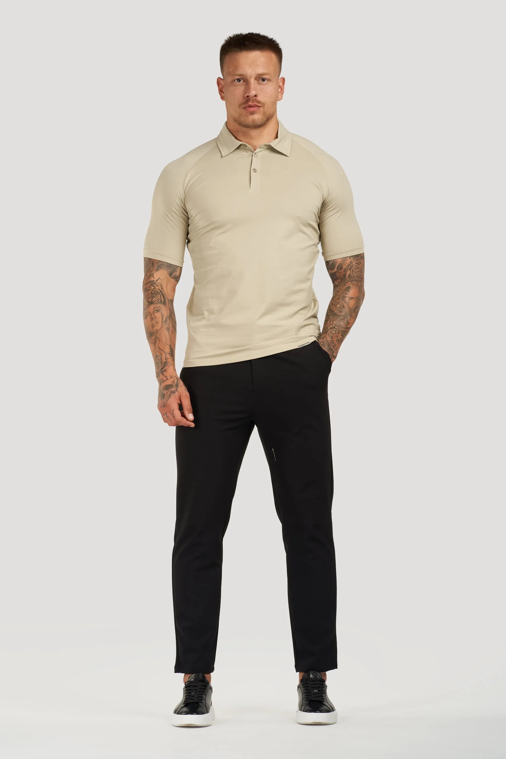 THE MUSCLE BUTTON POLO