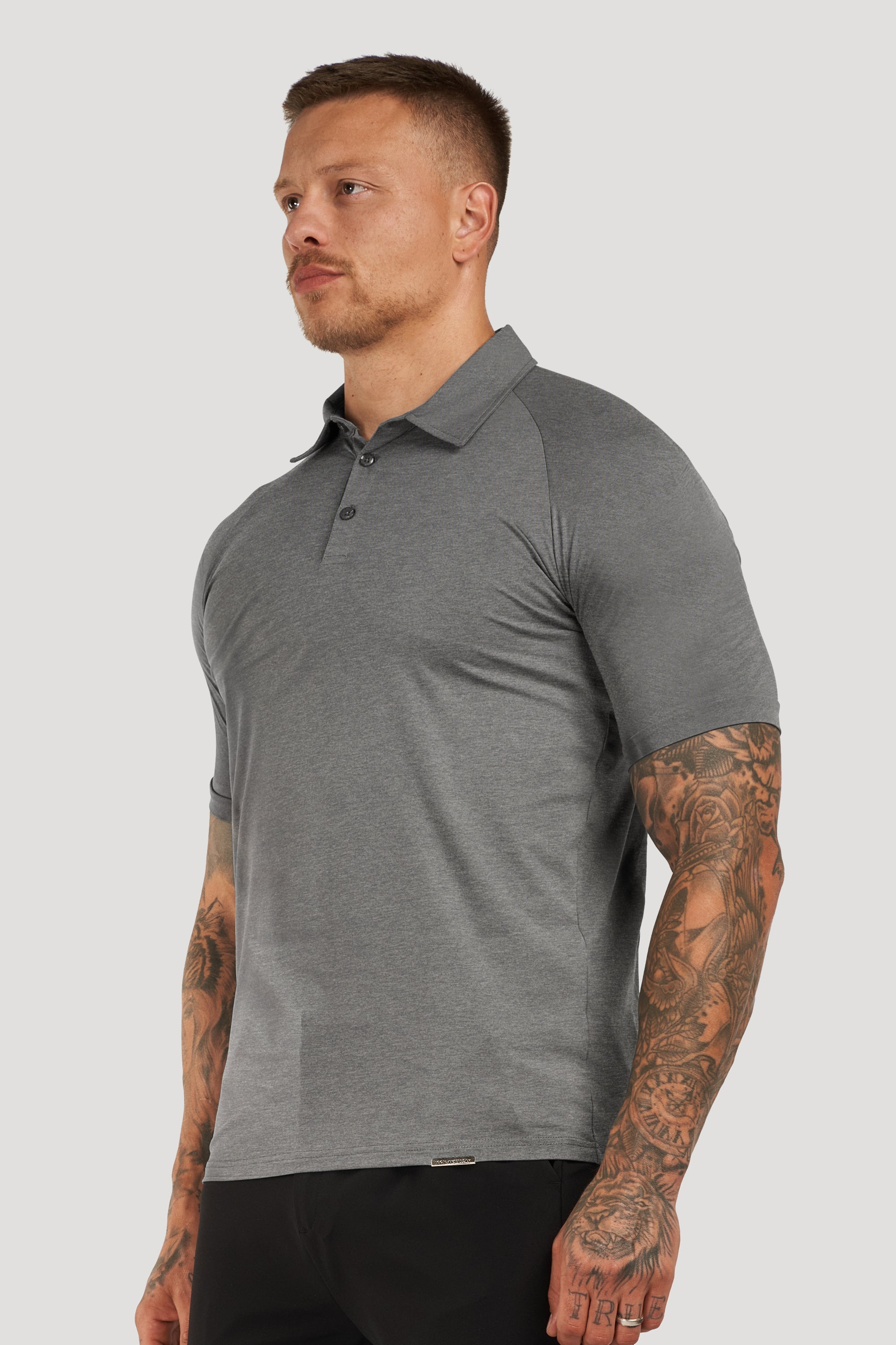 THE MUSCLE BUTTON POLO