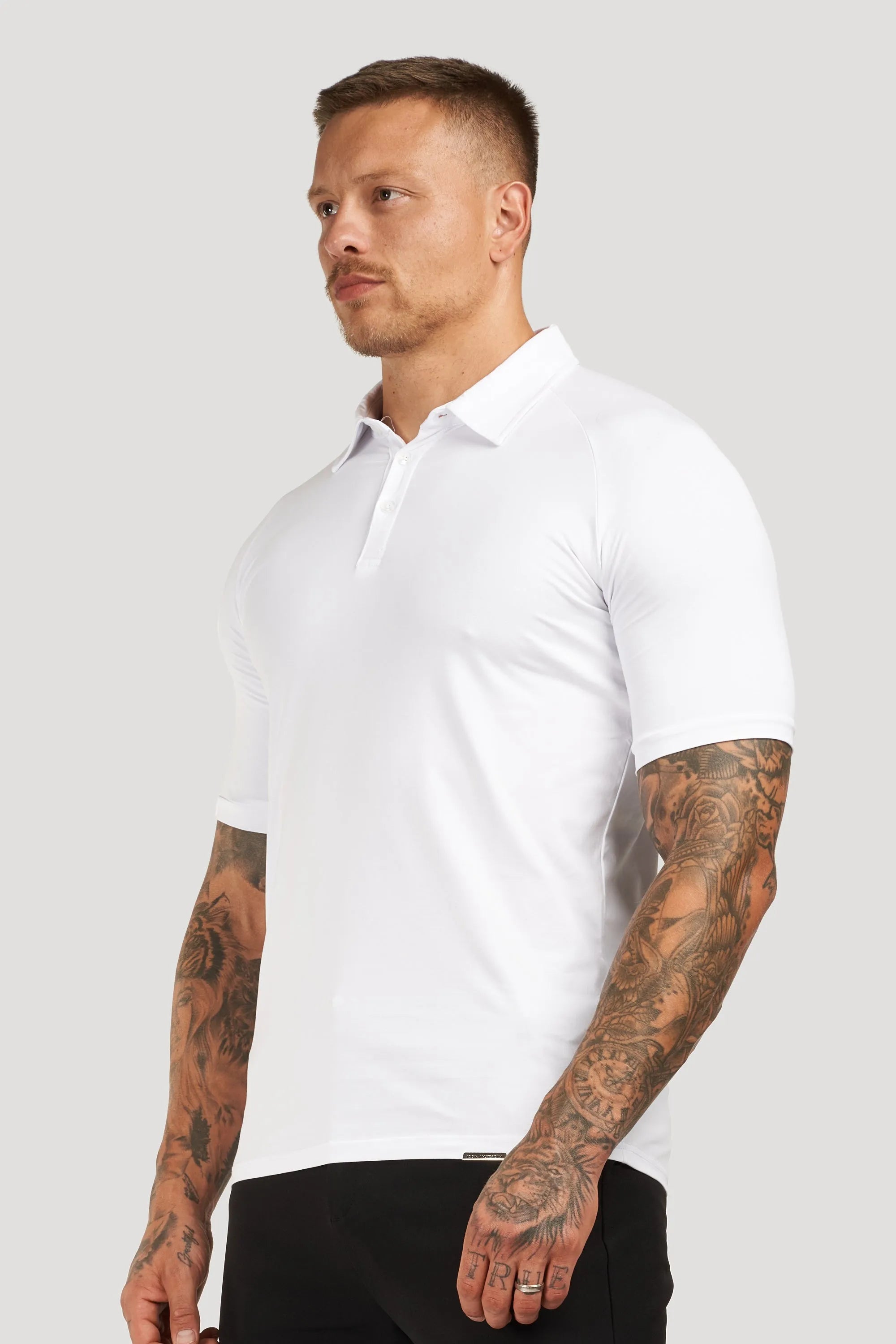 THE MUSCLE BUTTON POLO